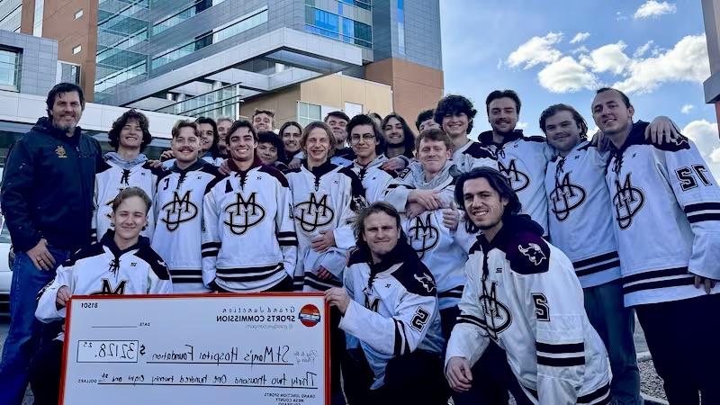 CMU Hockey Team Wins 2024 National Community Service Award
